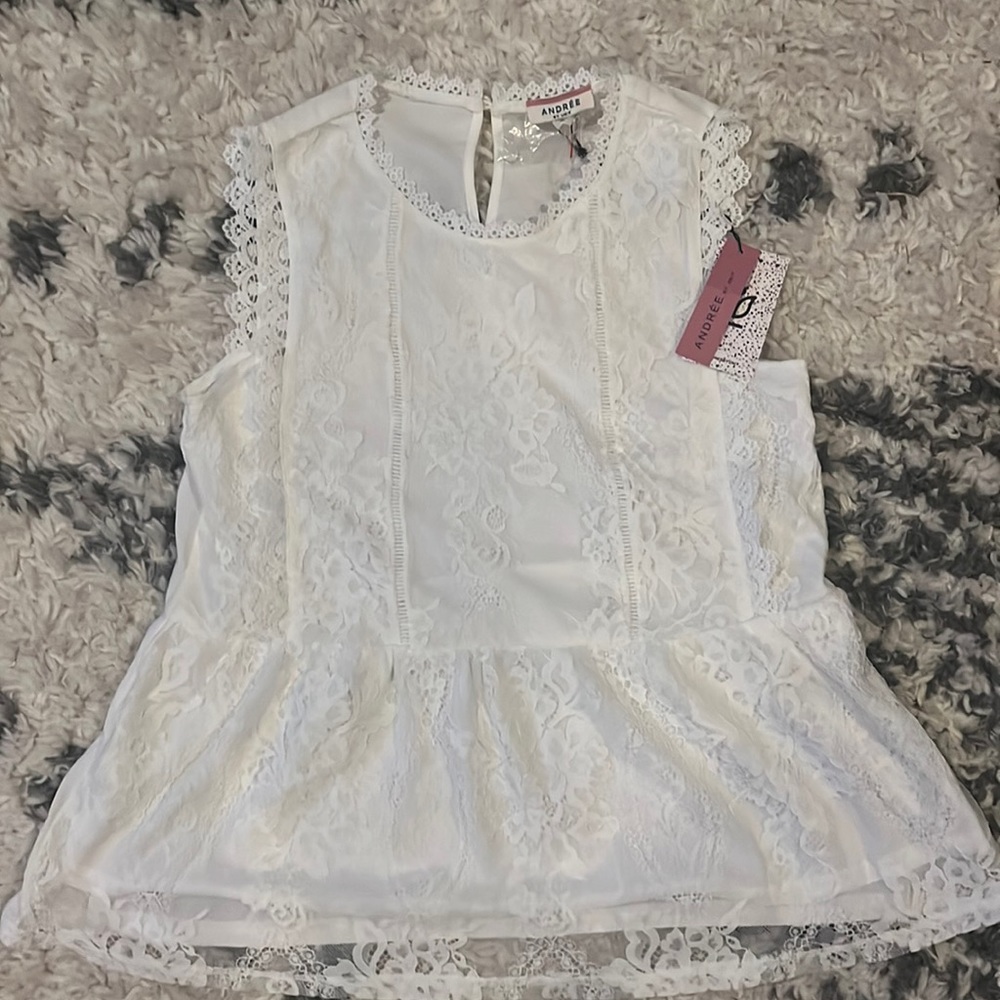Sleeveless white lace top
